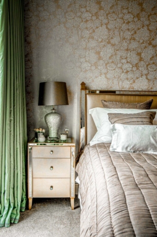 Bedroom suite High end bedroom suite in gold and beige, pattened wall paper and bedside table