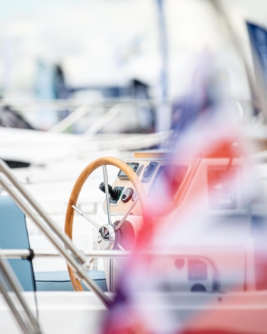 Yachts wheel Wheel of a sail yacht shot with a long lens to create blur